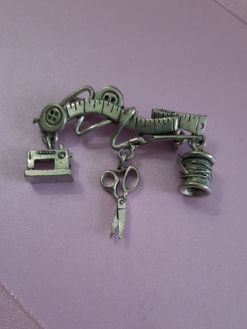 RIB Sewing-Themed Silver Tone Brooch with Sewing Machine, Scissors, Spool